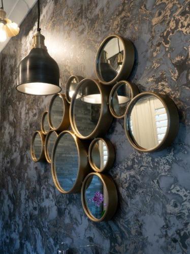 Mirrors on wallpaper